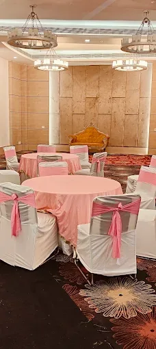Pink themed banquet seating by Shree Balaji Caterers