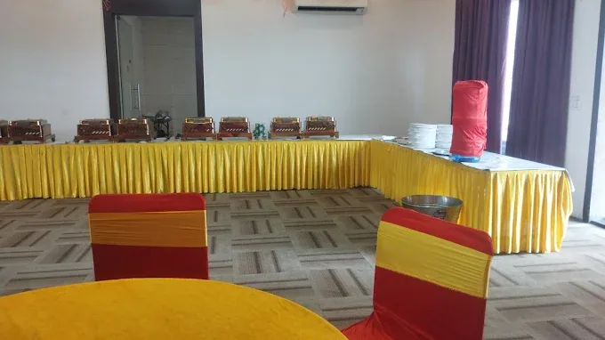 Yellow themed catering setup by Shree Balaji Caterers